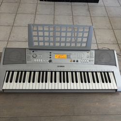 Yamaha YPT-300 Portable Keyboard - 61 Touch-Sensitive Keys + Music Stand 