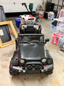 ride-on kids' Jeep-style power wheels vehicle