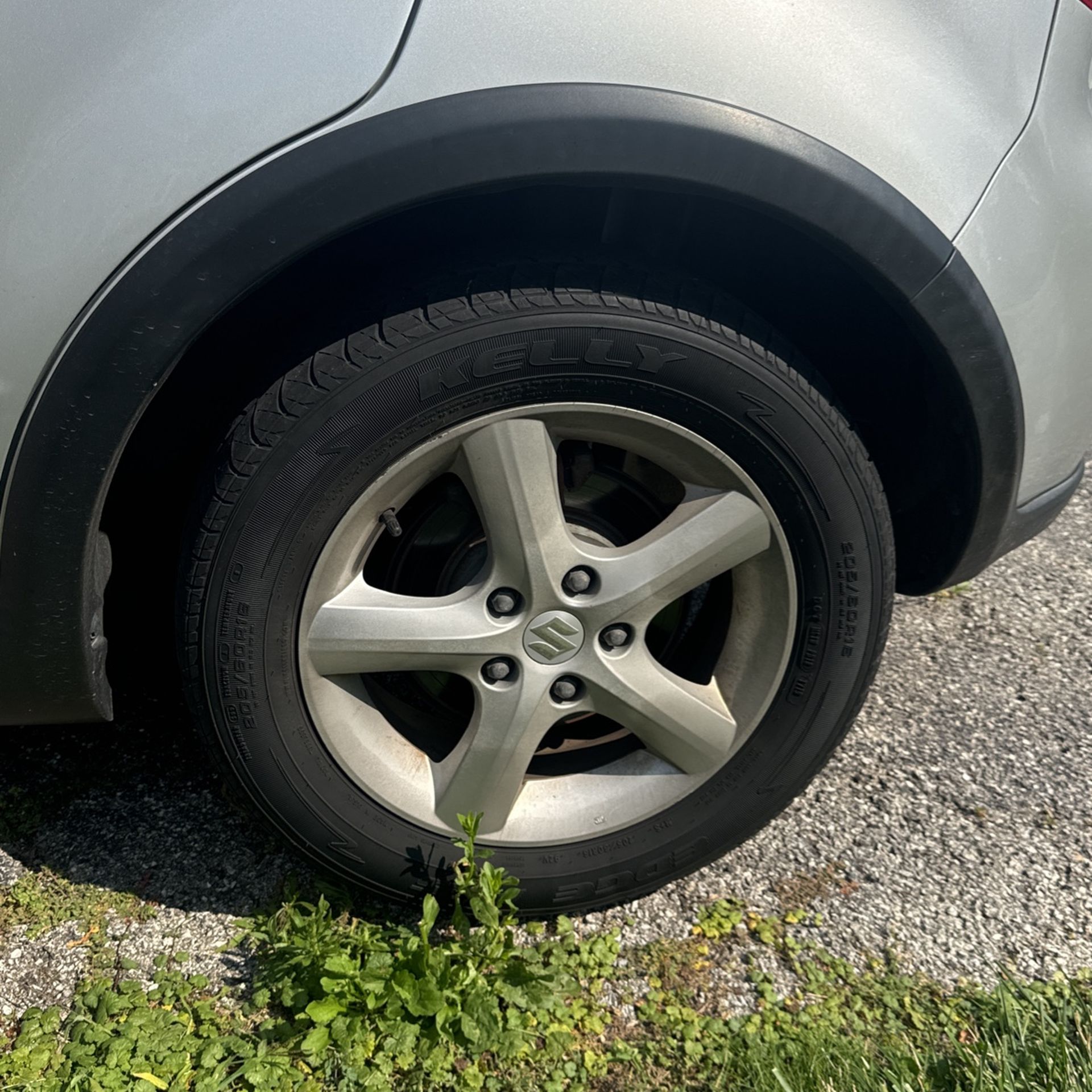 2009 Suzuki SX4 OEM 4x 16 Inch Rims and tires