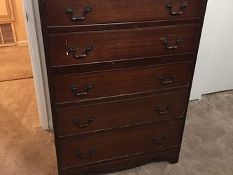 Five drawer Brown vertical dresser