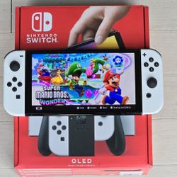 Nintendo Switch OLED  With 200 + Games