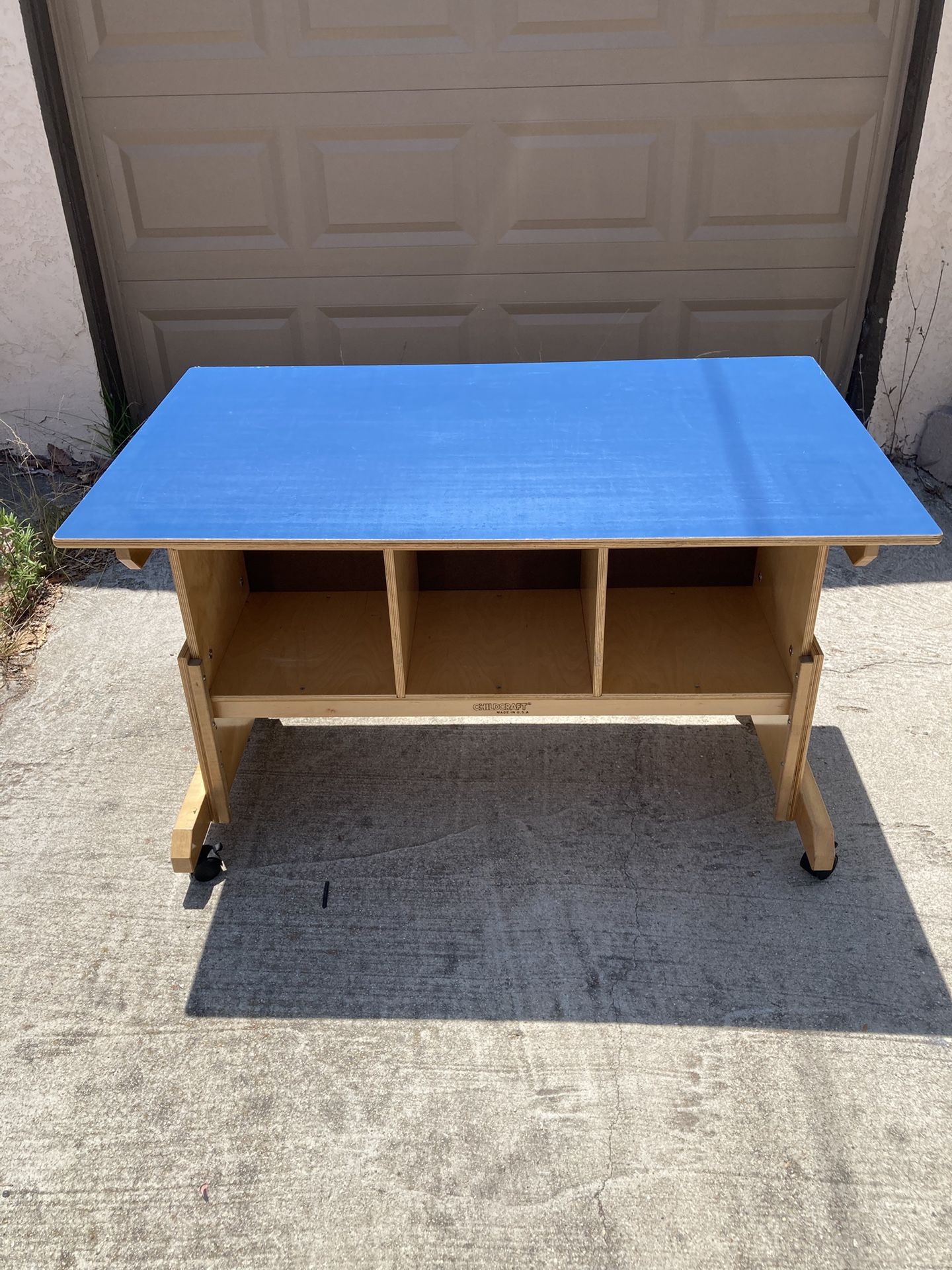CHILDCRAFT USA ACTIVITY/MEDIA TABLE WITH 3 CUBBIES-ADJUSTABLE W/WHEELS