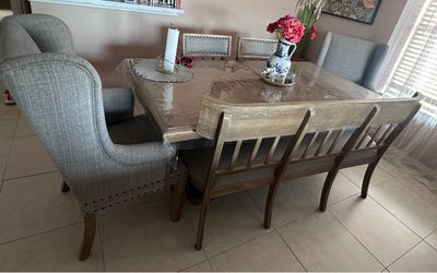 Table, 4 Chairs and a Bench