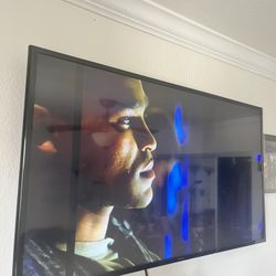 Samsung 49” Smart Tv W/ Wall Mount 