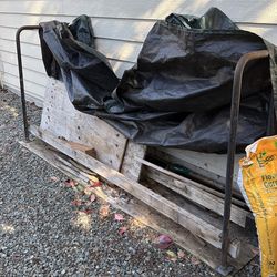 Metal stand for firewood with plastic zipper cover
