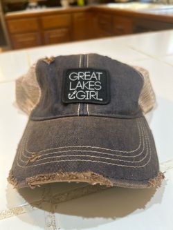 a "Great Lakes Girl" distressed trucker hat from Livnfresh
