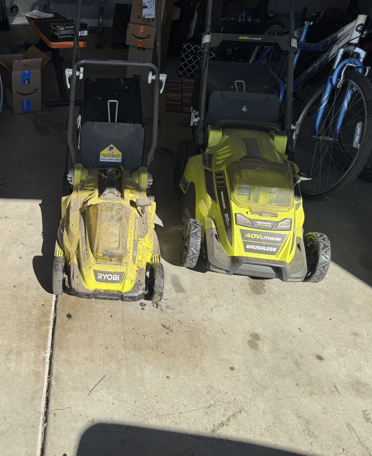 2 Ryobi Lawn Mowers (needs new Battery)