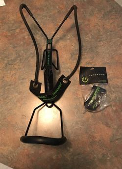 Hyper dog sling shot with tennis balls