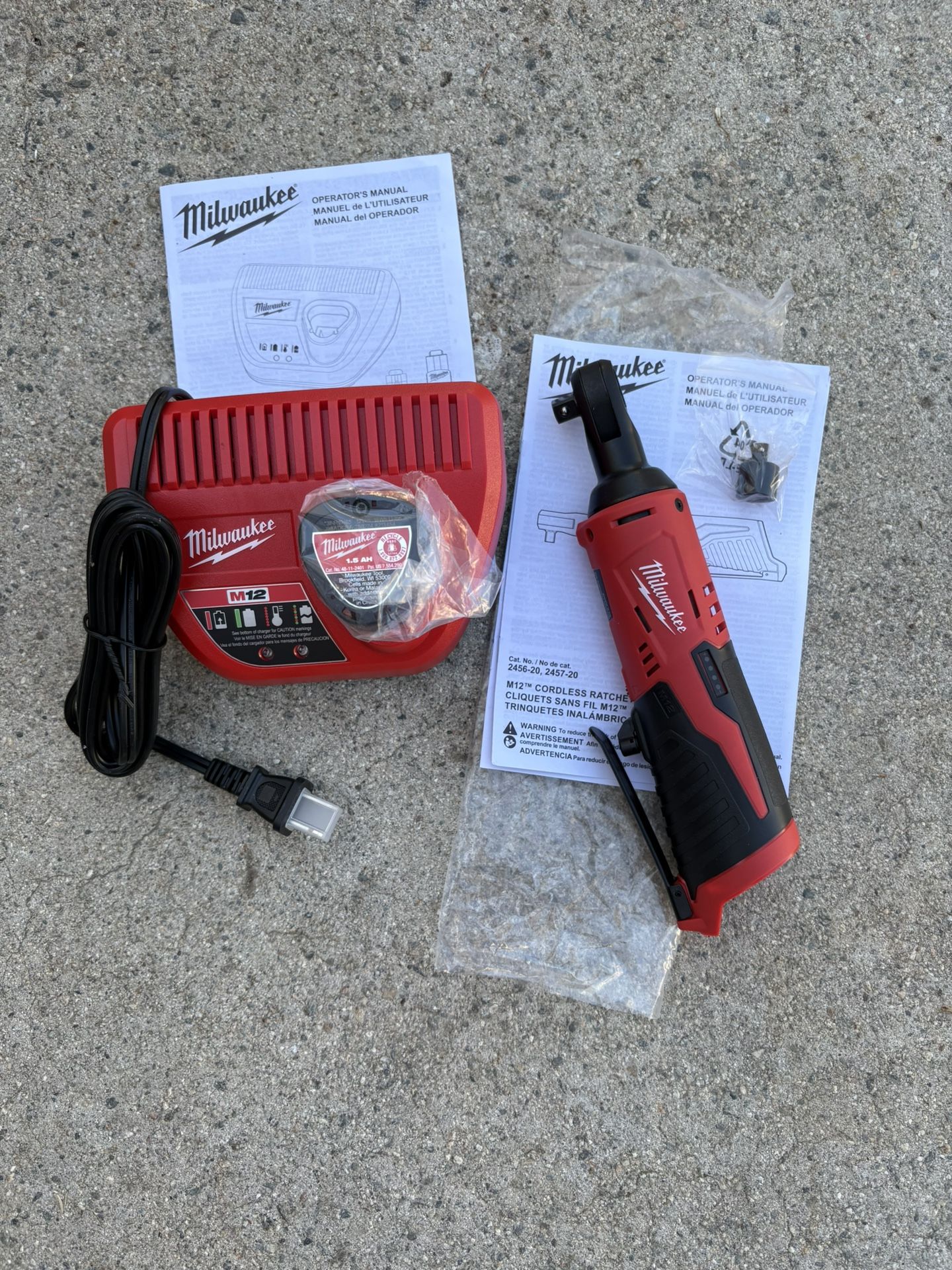 Milwaukee M-12 3/8 Ratchet 1.5AH Battery Pack With Charger. Toolkit