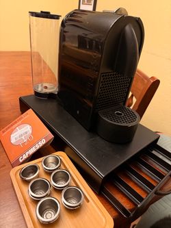 Nespresso Inissia Espresso Machine with Pod Drawer, Frother, and Reusable Pod Kit.