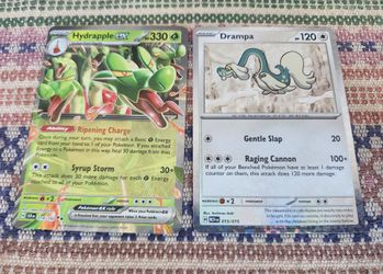 Hydrapple 014/142 and Drampa 015/015, both 2024 NM ENG Pokémon