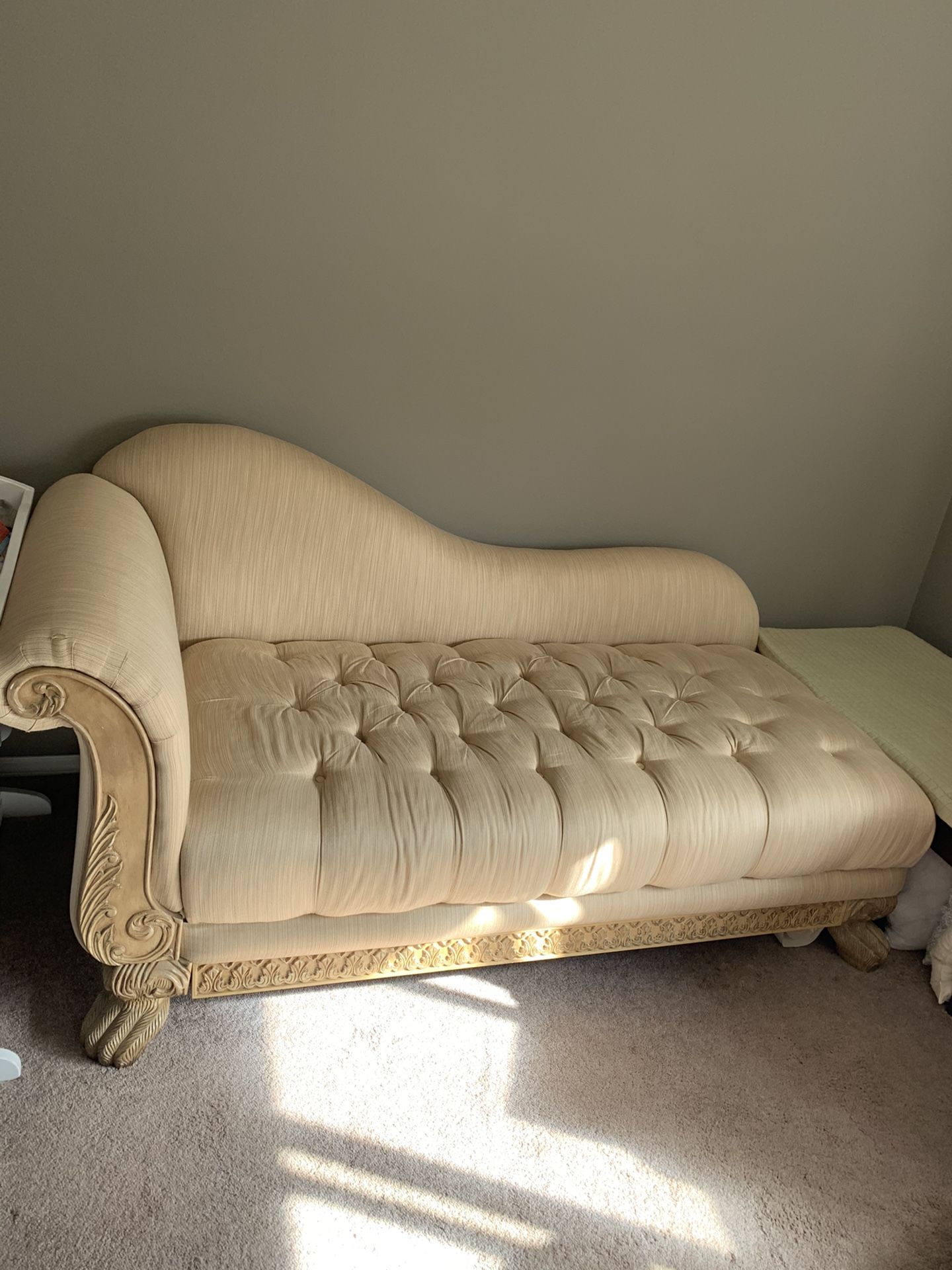 Elegant Chaise Lounge With Tufted Seat And Pillows