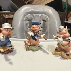 Disney’s three little pig figurines