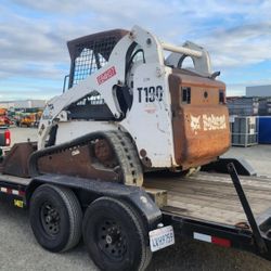 BOBCAT With Trenture Attachment 