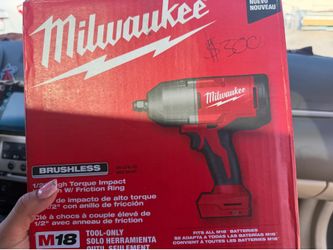 Milwaukee high torque impact wrench with 12 amp battery
