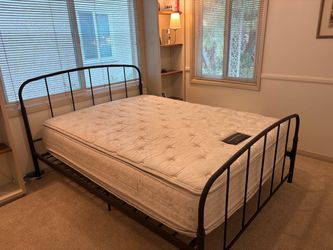 Bronze metal bed frame with queen mattress