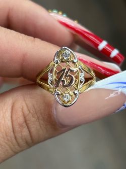 10kt gold 15 ring with CZ