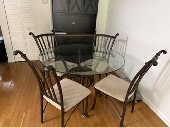 Glass dining table with chairs