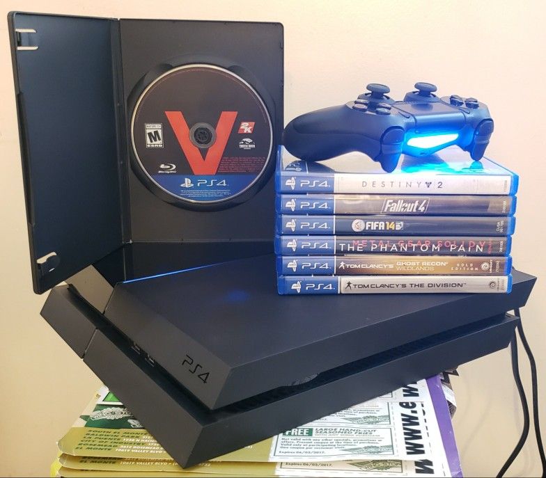 PS4, 500gb, controller, all cables, 7 games, lower firmware 6.71 ready to mods