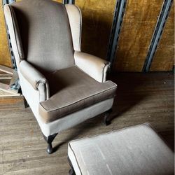 Gray/brown velvet accent chair with matching ottoman