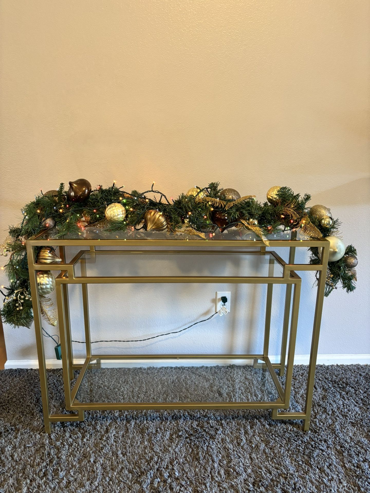 Like new Gold medal console table with glass