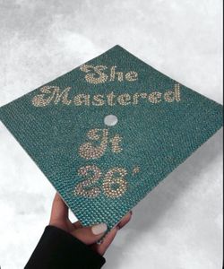 Fully bedazzled "She Mastered It 26'"' Graduation cap topper. Handmade, ready for pickup.