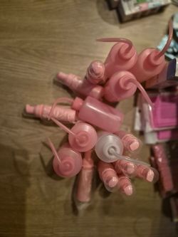 Pink Plastic Pump Tops and Bottle Caps Lot