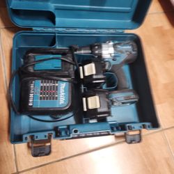 Makita 2 Battery And Charger 