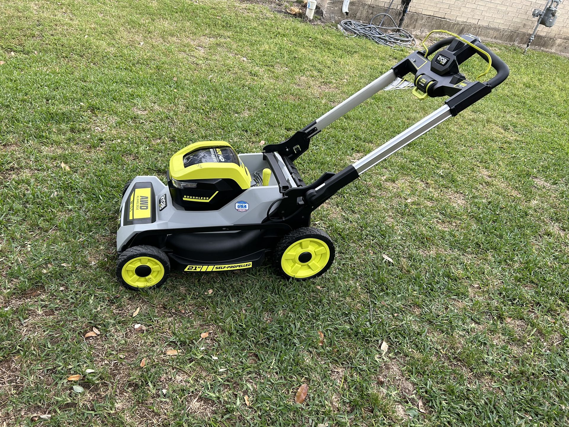 Unused Ryobi 40V Cordless Lawn Mower All Wheel Drive Tool Only No Battery No Charger It Has A Piece Broken From The Handle 