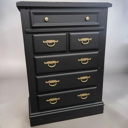 Tall black dresser