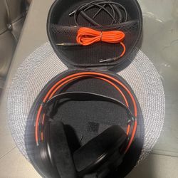 The headphones in the image are professional studio AKG K712 PRO.