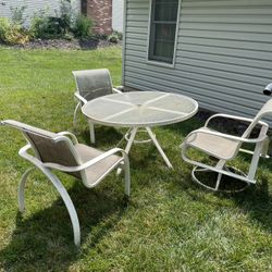 Patio Table And Three Chairs