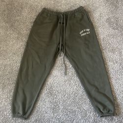 Olive green essentials fear of god sweats