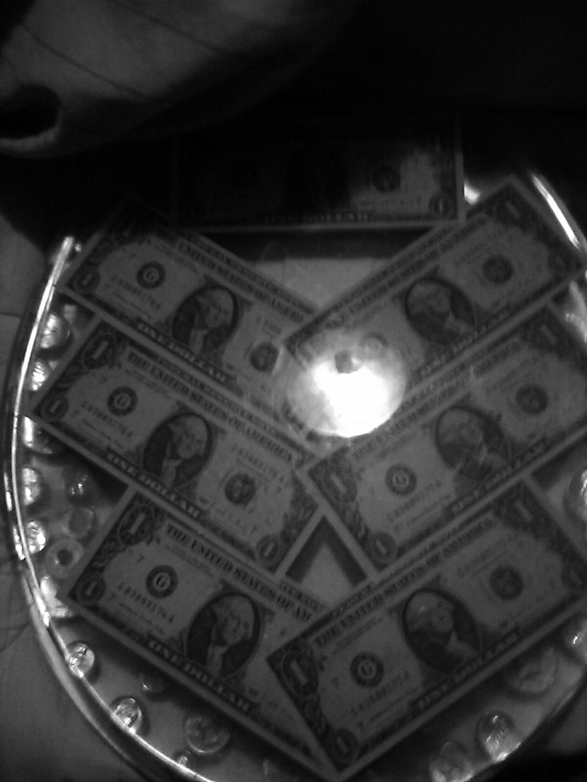 Toilet Seat with US Currency in it