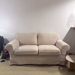 Very Comfortable Beige Loveseat Couch