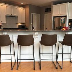 Bar Stools New in Original Packagings Set of 4 Brown Leather Retailed For $620.00.