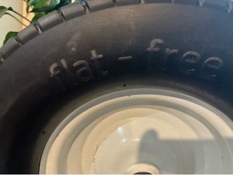 NEW NEVER FLAT TIRE LAWN MOWER AND ZERO TURN
