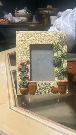 This vintage picture frame by Raj Natural Would