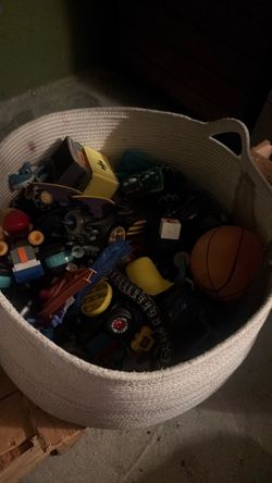 Two containers filled with toys