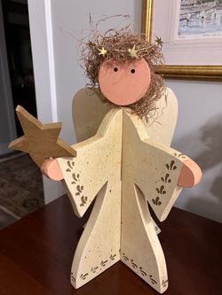 Handcrafted wooden angel- 15 inches tall and 10 inches across
