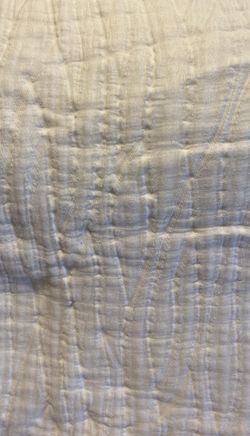 Comforter Quit sobre cama