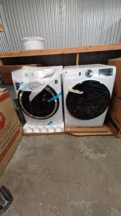 Brand new ge stackable washer and electric dryer set 
