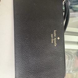 Kate Spade black pebbled leather zip wristlet with gold logo