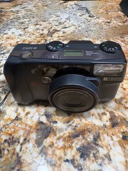 35 mm camera Ricoh R-125Z (also known as the RZ 125 or Shotmaster 125Z) 35mm point-and-shoot film camera.