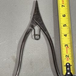 Bonney B21 lock ring pliers, stamped with Bonney and "Made in U.S.A." near the pivot.  The overall length is 7.8 inches, and the finish is plain steel