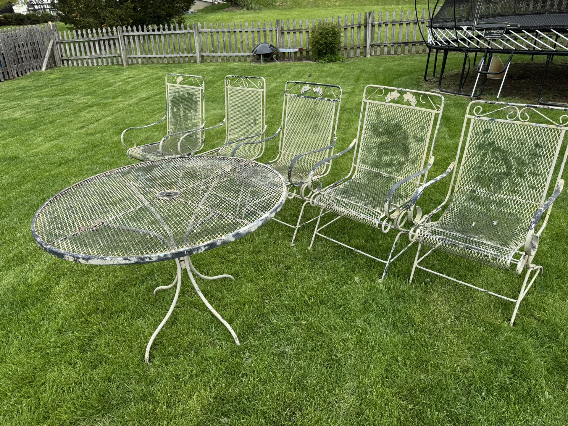 Vintage Woodard Wrought Iron table and 5 chairs