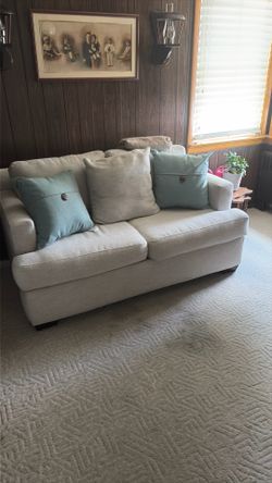Sofa, swivel chair and entertainment cabinet and 39” flat screen television $500 or best offer