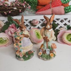 Hall 326.  ***NOTE GIRL 1 EAR GLUED*****
This Vintage K's Collection Rabbit Bunnies Figurine "Easter Parade" Boy & Girl Set is the perfect addition to