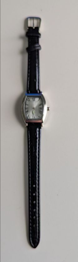 New stylish watch with black  strap and silver dials.