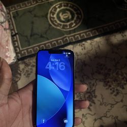 2 iPhone 14pro , One Brand New , Other Back Damaged Bad But Still Works.